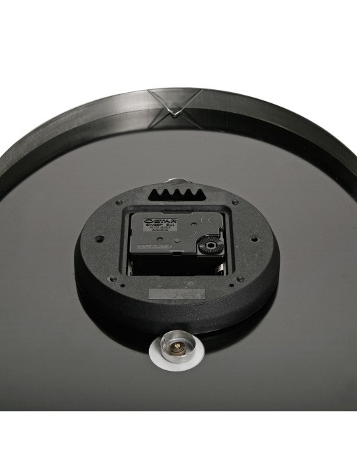 Oval shaped metal wall clock